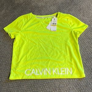BRAND NEW WITH TAGS!! woman's yellow Calvin Klein crop top